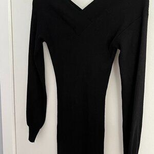 Classic knit black dress with long sleeves